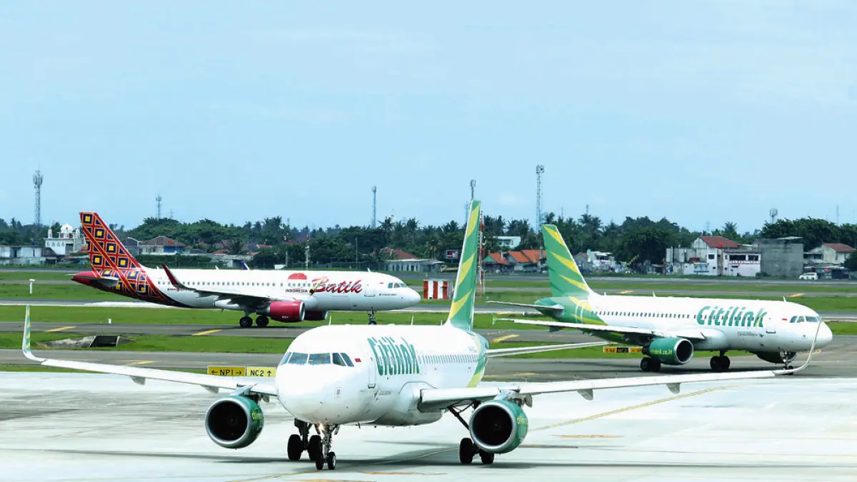 AKTIVITAS beberapa maskapai di Bandara Soekarno Hatta, Cengkareng, beberapa waktu lalu. F. PUGUH SUJIATMIKO/JAWA POS