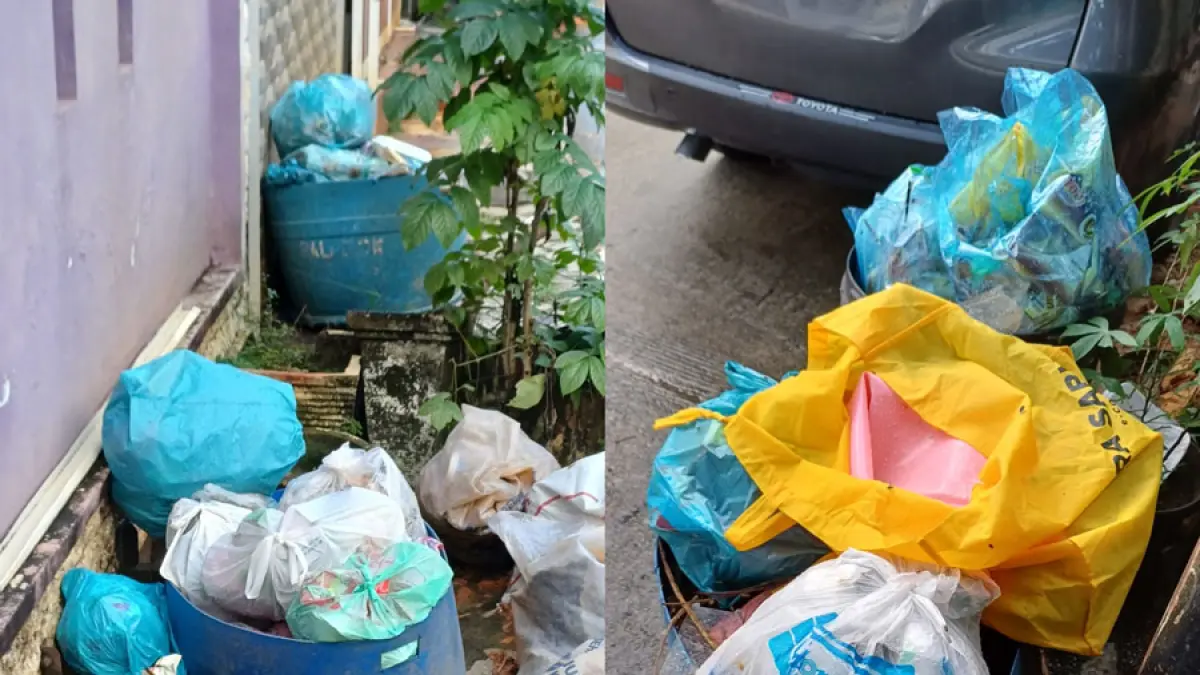 Tumpukan sampah terlihat menggunung di Perumahan Legenda Bali Blok D3, Batam, Rabu (20/5). Warga mengeluhkan sampah yang tidak diangkut selama lebih dari sepekan hingga menimbulkan bau tak sedap. Foto: Warga untuk Batam Pos