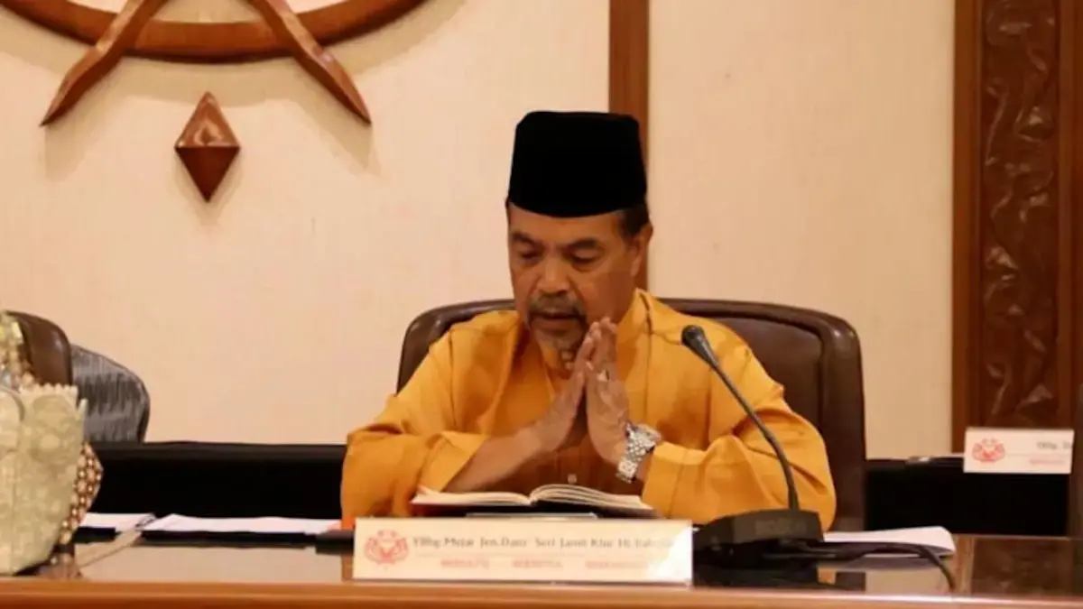 Mantan menteri urusan agama Malaysia Jamil Khir Baharom, yang juga anggota dewan tertinggi UMNO, pada pertemuan partai pada bulan Februari. (Facebook/Jamil Khir Baharom)