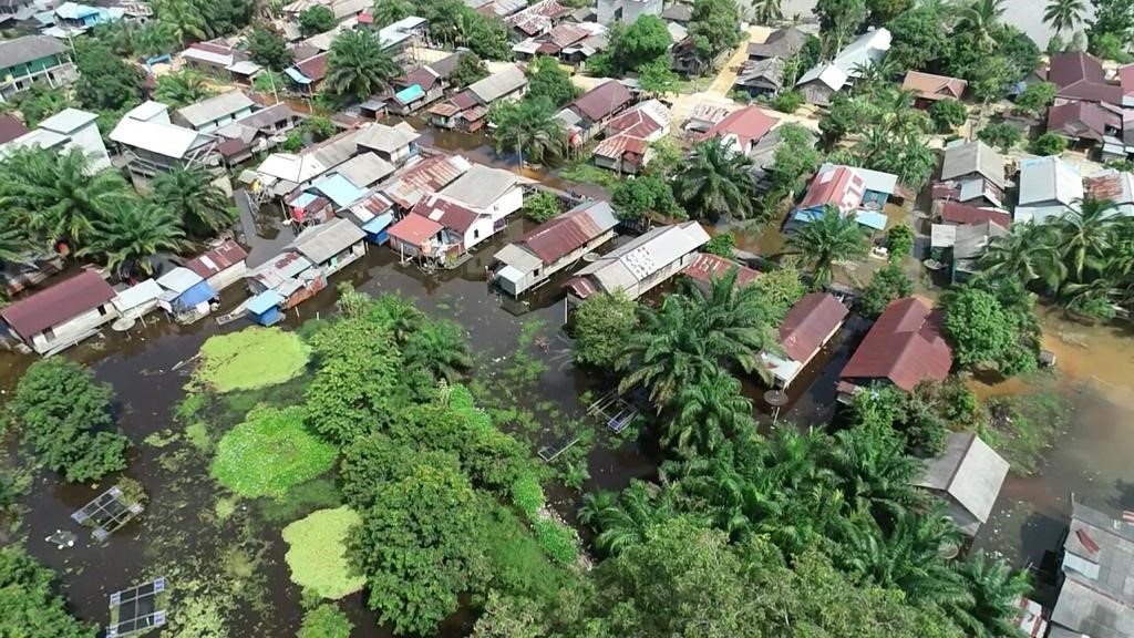 BANJIR: Lingkungan pemukiman warga di Kecamatan Belantikan Raya Kabupaten Lamandau yang mulai terendam banjir, luapan air Sungai Belantikan, Sabtu (6/1/2024) (Istimewa/BPBD Lamandau).