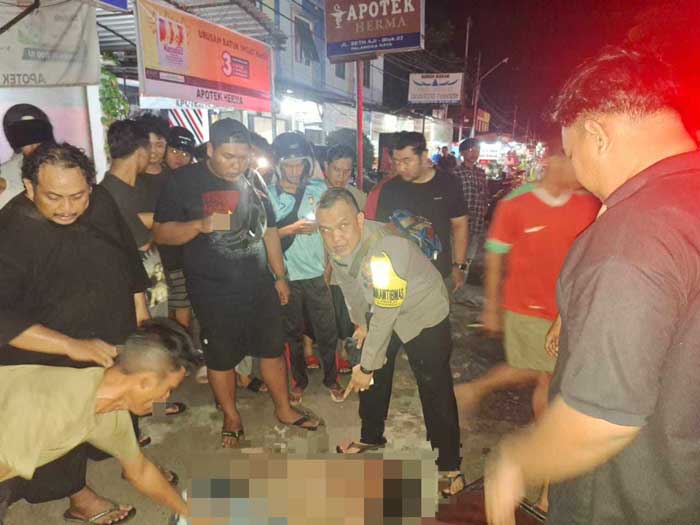 DIAMANKAN : MJ (40) si jukir mabuk miras diamankan warga lantaran mengamuk dan membuat onar, Minggu (2/6) malam. ISTIMEWA/RADAR PALANGKA