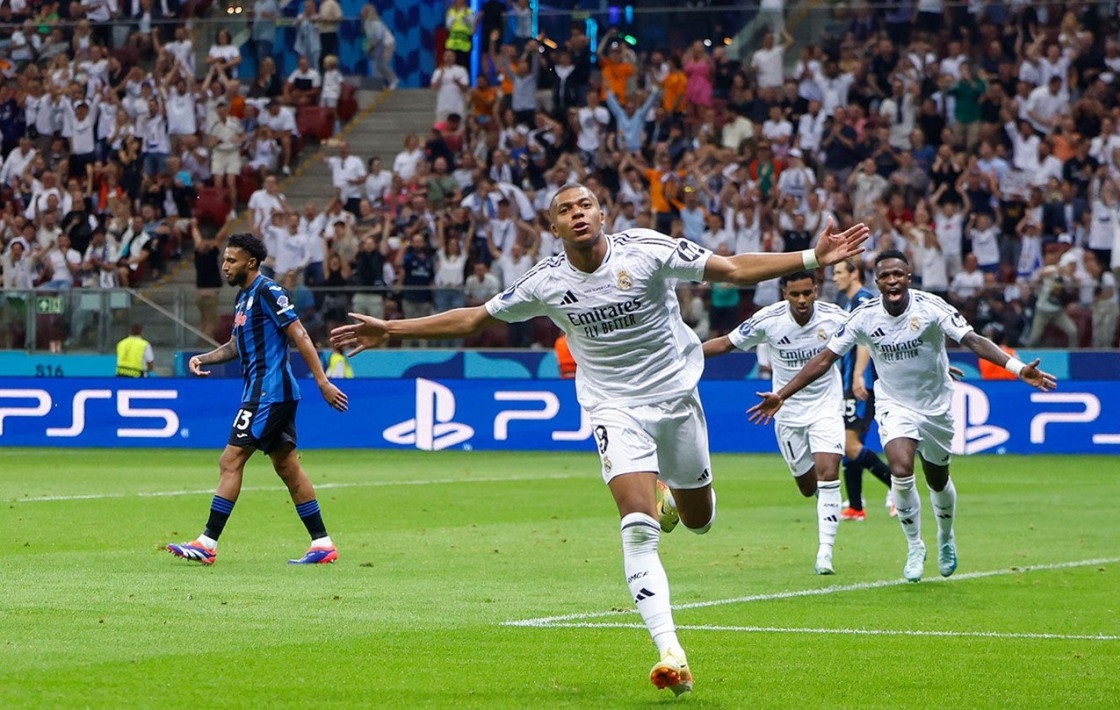 ANDALAN : Striker Real Madrid Kylian Mbappe saat berselebrasi setelah mencetak gol dalam salah satu laga  di La Liga, baru-baru tadi.