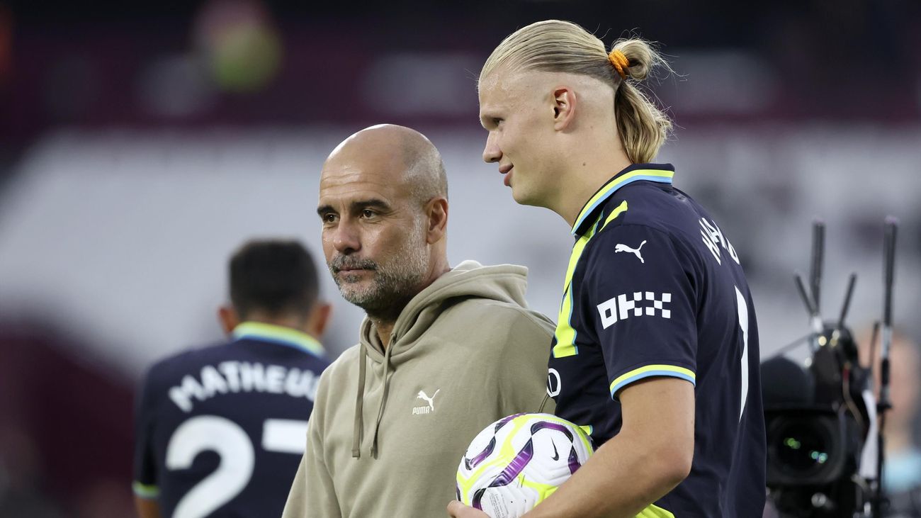 Pep Guardiola dan striker andalannya di Manchester City, Erling Haaland.