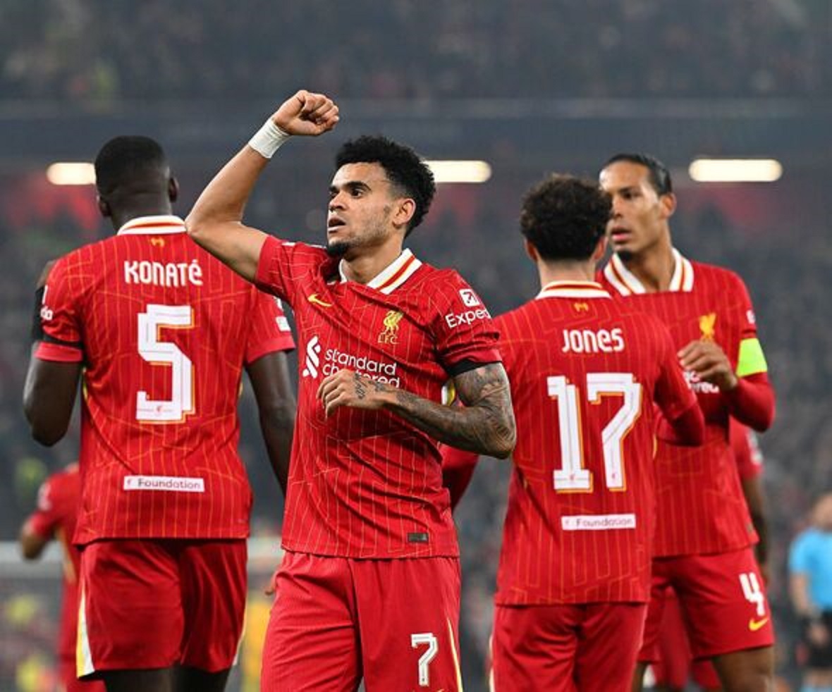 KOKOH: Pemain Liverpool saat memenangi lanjutan laga Liga Champions melawan Bayer Leverkusen, Rabu (6/11) dini hari WIB.