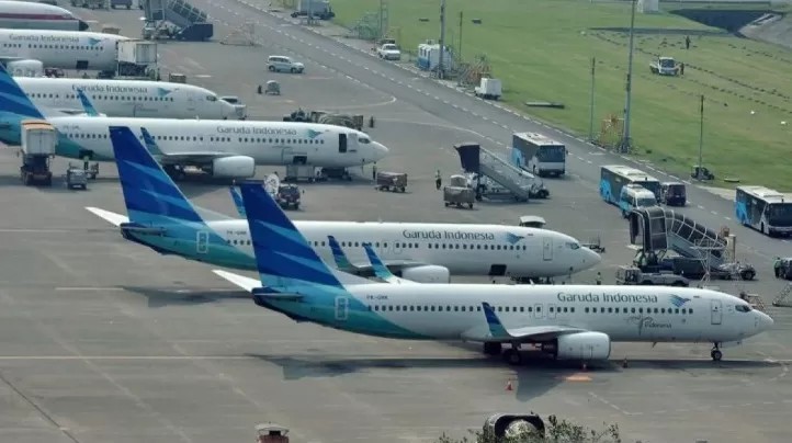 ANTRE: Sejumlah pesawat milik maskapai Garuda Indonesia parkir di areal Bandara Internasional Soekarno Hatta, Tangerang, Banten. (ANTARA)