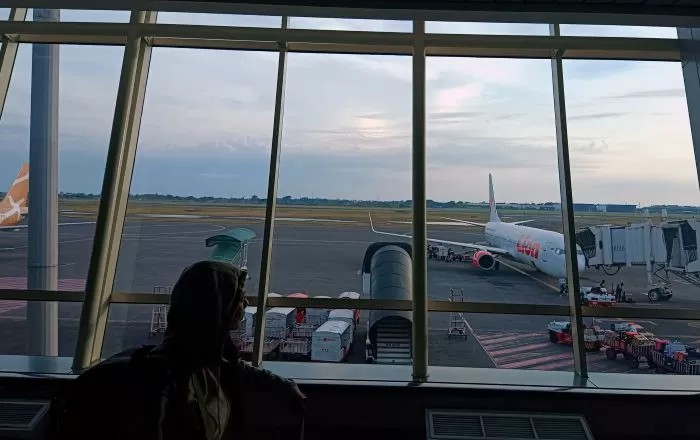 PERJALANAN: Pemerintah menyiapkan diskon harga tiket pesawat untuk angkutan lebaran 2025. (ANDY SATRIA)