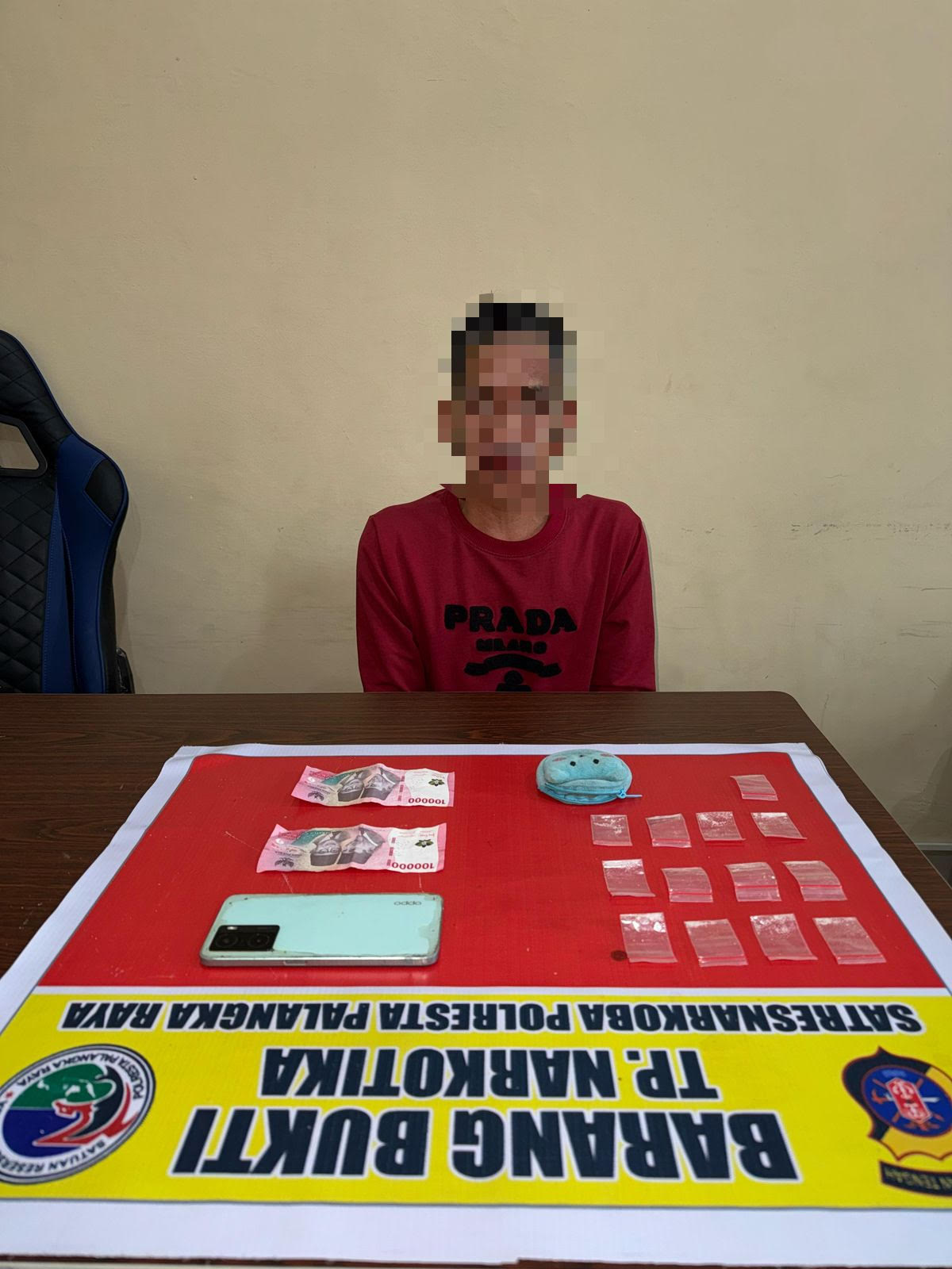 En (50) ketika diamankan di Mapolresta Palangka Raya, bersama sejumlah barang bukti peredaran narkotika jenis sabu.