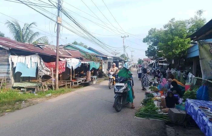 RAWAN KEJAHATAN:  Kawasan Pasar Sabtu, Kuala Kapuas yang baru dihebohkan dengan insiden pembobolan rumah kosong oleh pelaku pencurian. SABRIANOOR/RADAR SAMPIT