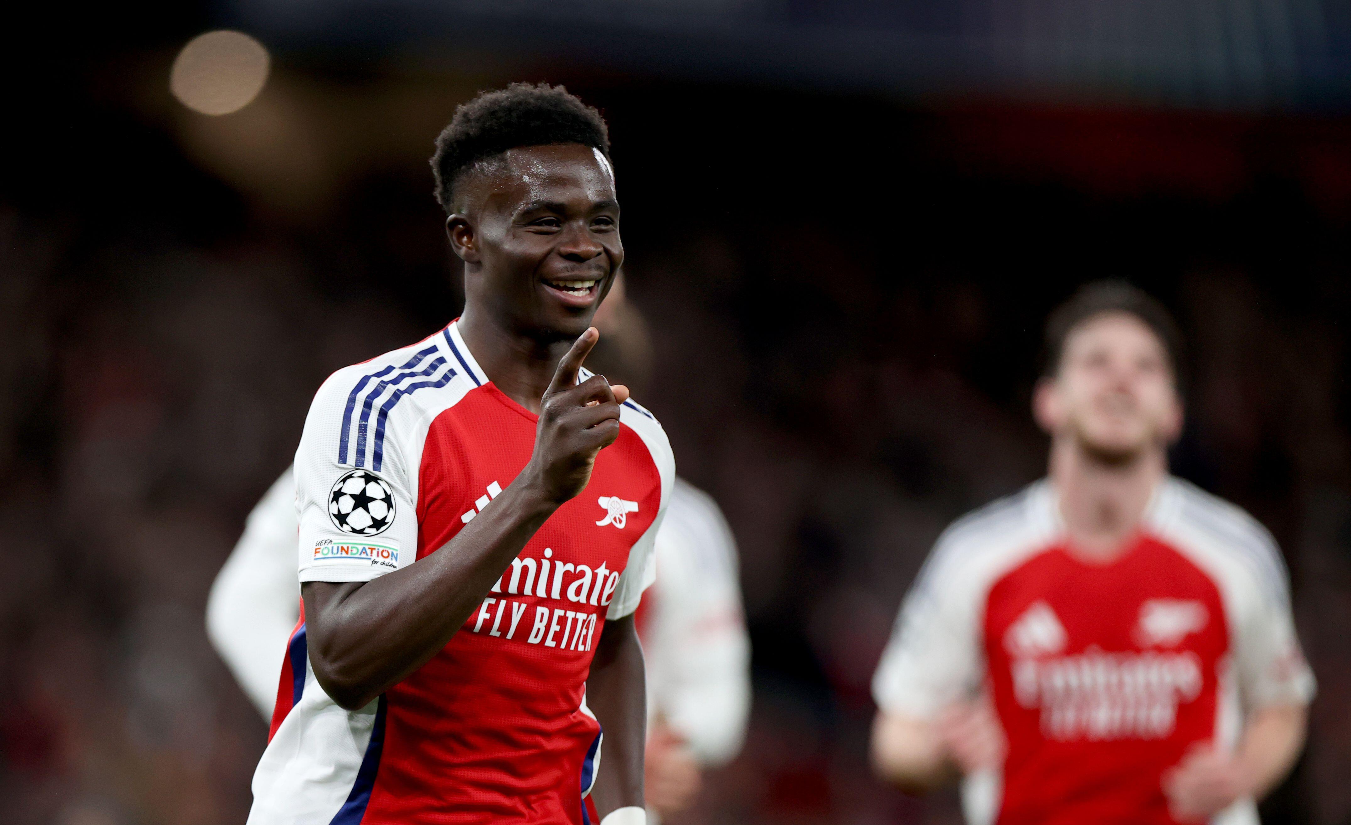 Striker Arsenal Bukayo Saka, saat selebrasi gol di ajang Liga Champions