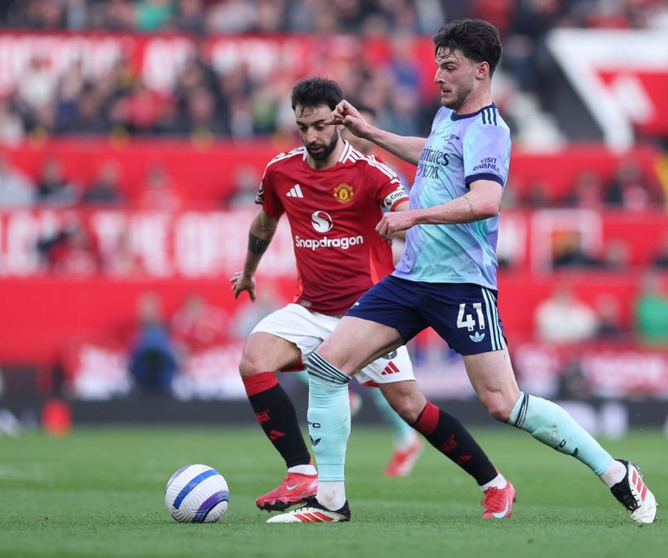 Pertemuan pemain Man United dan Arsenal di premier league musim lalu.