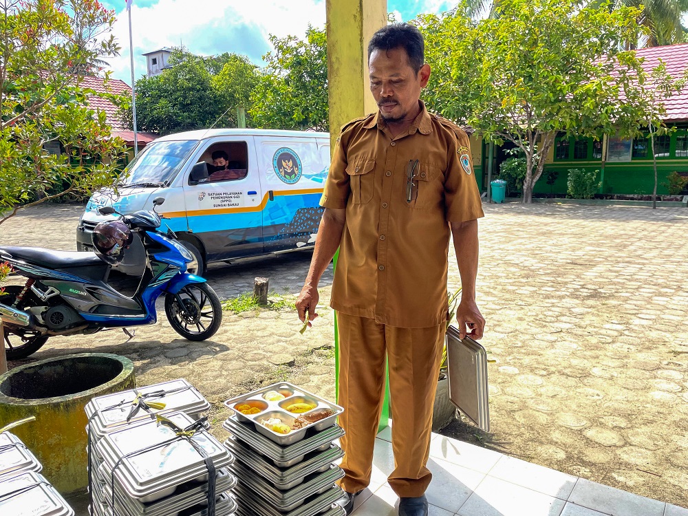 Program Makan Bergizi Gratis (MBG) di SDN 1 Persil Raya.