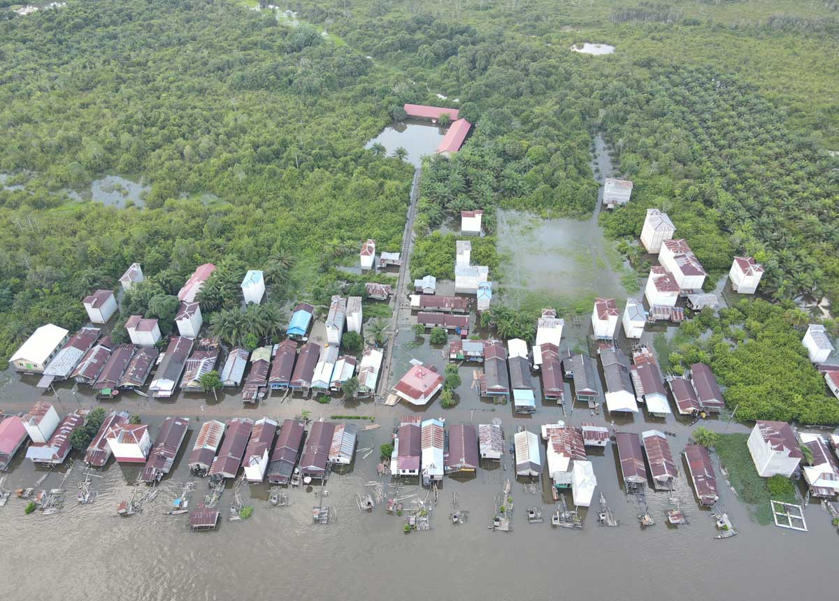 BANJIR: Foto udara banjir yang melanda Desa Hanjalipan, Kamis (25/9).