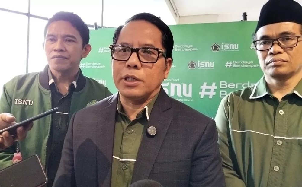 Sekjen Kementerian Agama sekaligus Ketua Umum Ikatan Sarjana Nahdlatul Ulama (ISNU) Kamaruddin Amin (tengah) di Jakarta  (Dony)