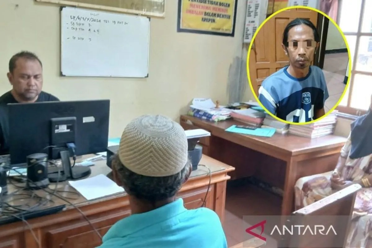 LAPORAN: Aparat kepolisian saat menerima laporan dugaan penganiayaan kepada seorang ibu rumah tangga. (antara)