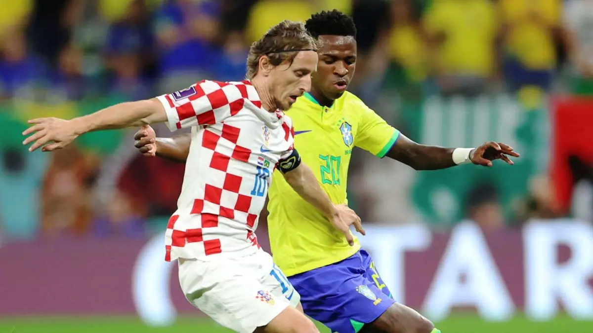 Luca Modric dan Vinicius jr yang diprediksi bakal bertemu dalam persahabatan saat membela timnas masing-masing, pagi ini (1/4) WIB./net