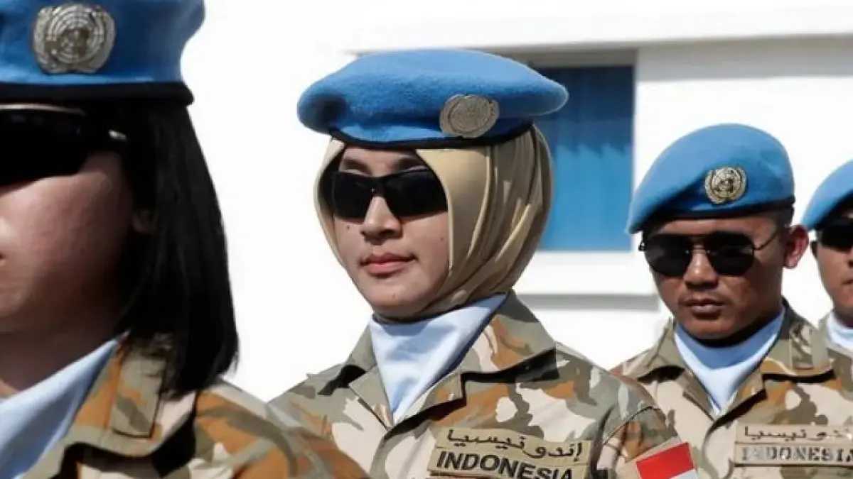 Anggota penjaga perdamaian Indonesia yang tergabung dalam United Nations Interim Force in Lebanon (UNIFIL) mengikuti upacara di markas mereka di Lebanon selatan pada 2022 (SCMP)