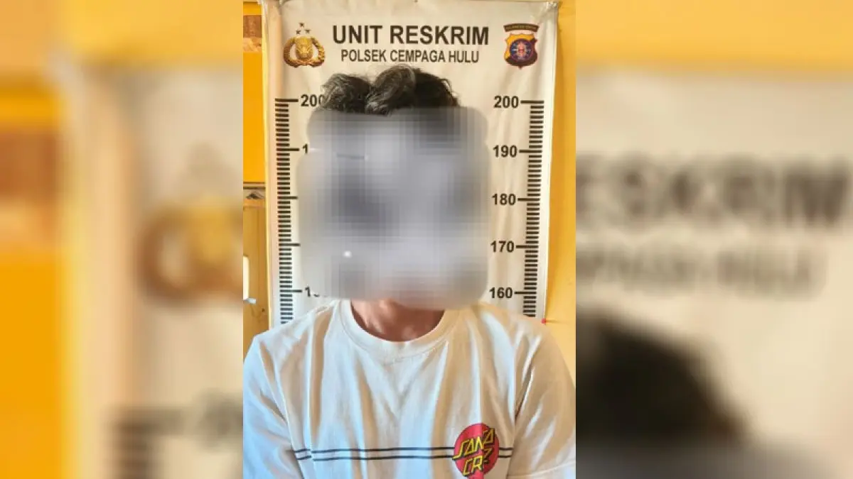 Tersangka pembacokan di Desa Bukit Batu, Kecamatan Cempaga Hulu, berinisial RI (39), saat diamankan polisi. (Humas Polres Kotim)