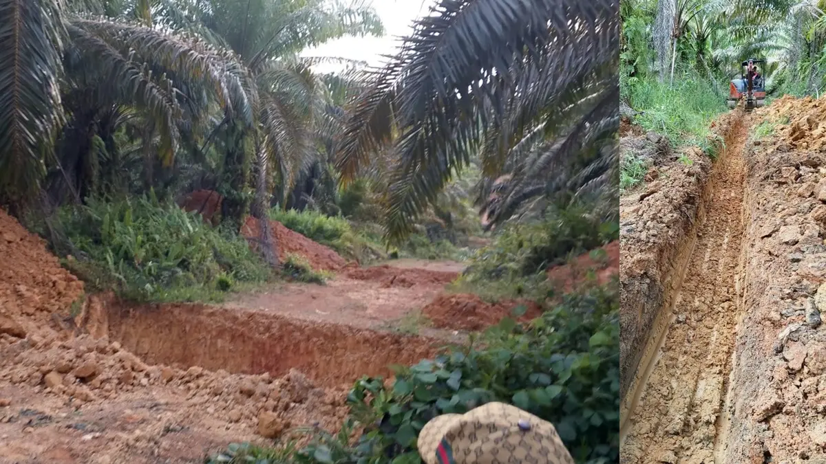 BATAS FISIK: Parit pembatas yang memisahkan lahan milik warga (kanan) dan areal perusahaan (kiri) di Desa Bukit Buluh, Kecamatan Seruyan Tengah.