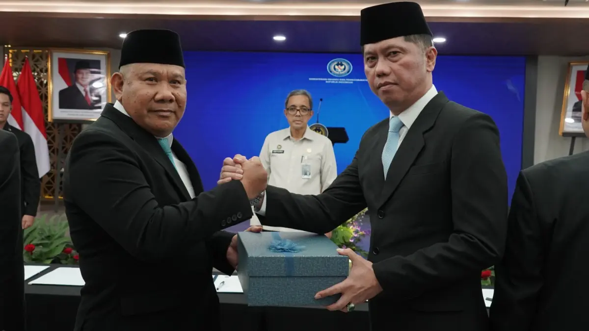 Kepemimpinan di Kanwil Direktorat Jenderal Pemasyarakatan (Ditjenpas) Kalteng resmi berganti, dari I Putu Murdiana kepada Hensah.(istimewa)