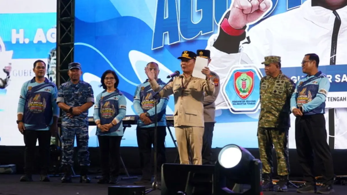 SAMBUTAN: Gubernur Kalteng Agustiar Sabran saat menyampaikan sambutannya pada Malam Apresiasi Olimpiade Olahraga Siswa Nasional Tingkat Provinsi  Kalteng, baru-baru tadi. FOTO: MMC KALTENG/RADAR SAMPIT