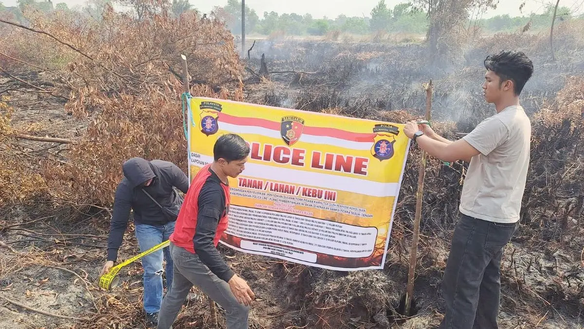 GARIS POLISI : Polsek Sabangau memasang police line di lokasi bekas Kebakaran Hutan dan Lahan (Karhutla) di Kecamatan Sabangau, Kota Palangka Raya. FOTO: IST/RADAR SAMPIT