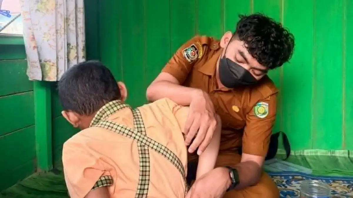 TERAPI : Pusat Layanan Autis (PLA) Kota Palangka Raya di bawah naungan Dinas Pendidikan (Disdik) Kota Palangka Raya mengalihkan terapi tatap muka menjadi pendampingan langsung ke rumah anak. FOTO: DODI/RADAR SAMPIT