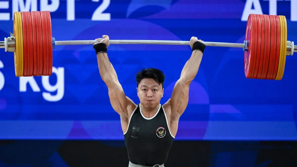 Rahmat Erwin Abdullah saat memenangkan medali emas untuk Indonesia di Asian Games 2026, Tokyo. (dok.antara)