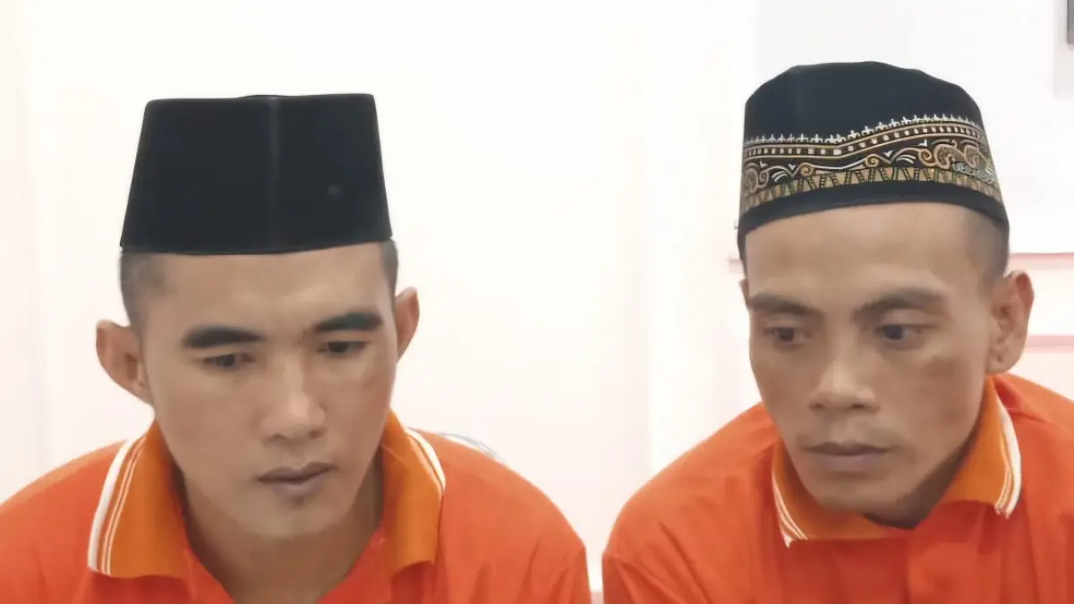 Saleh dan Jupri menjalani sidang perdana di Pengadilan Negeri Nanga Bulik.&nbsp; (Ria/Radar Sampit)