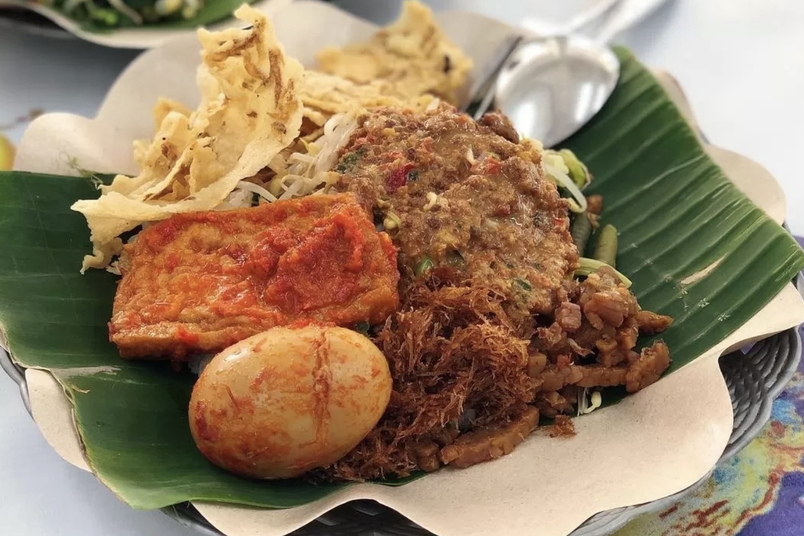 Coba ikuti resep pecel Madiun yang cocok untuk sarapan atau makan siang sehat dan mengenyangkan. (Instagram/@mimolette_1106)