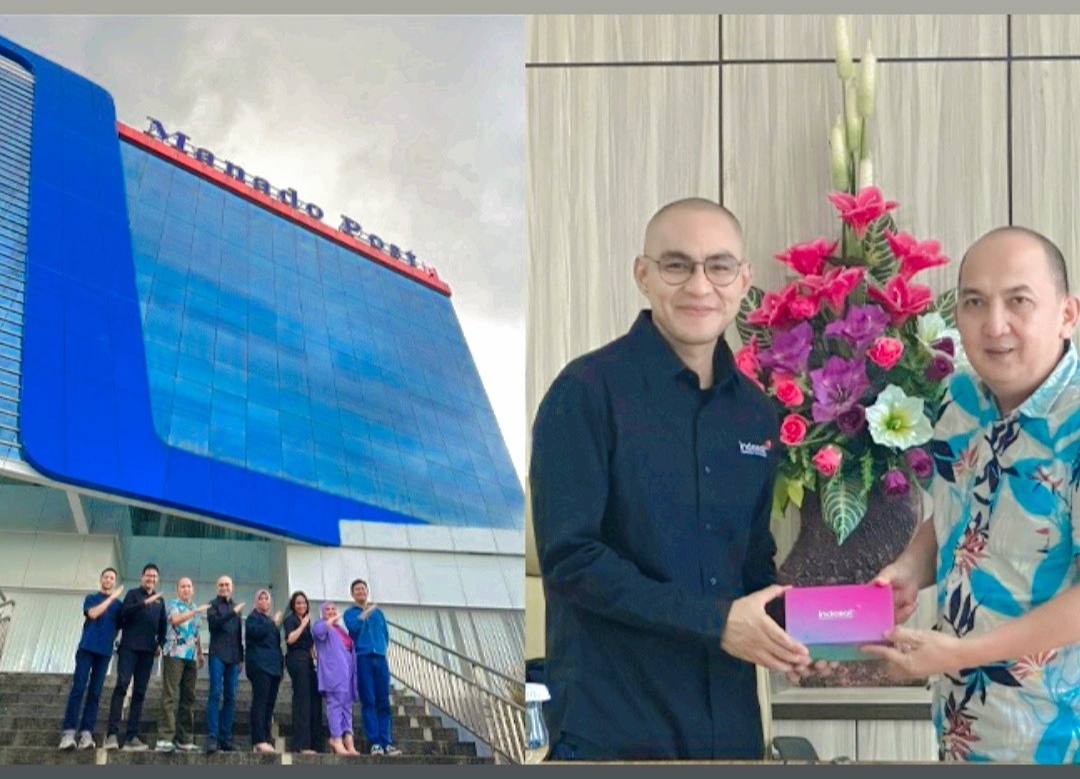 Senior Vice President Head of Corporate Communications Indosat Ooredoo Hutchison Steve Saerang, saat menyerahkan cendera mata untuk Dirut MP Marlon Sumaraw, Selasa (19/12)