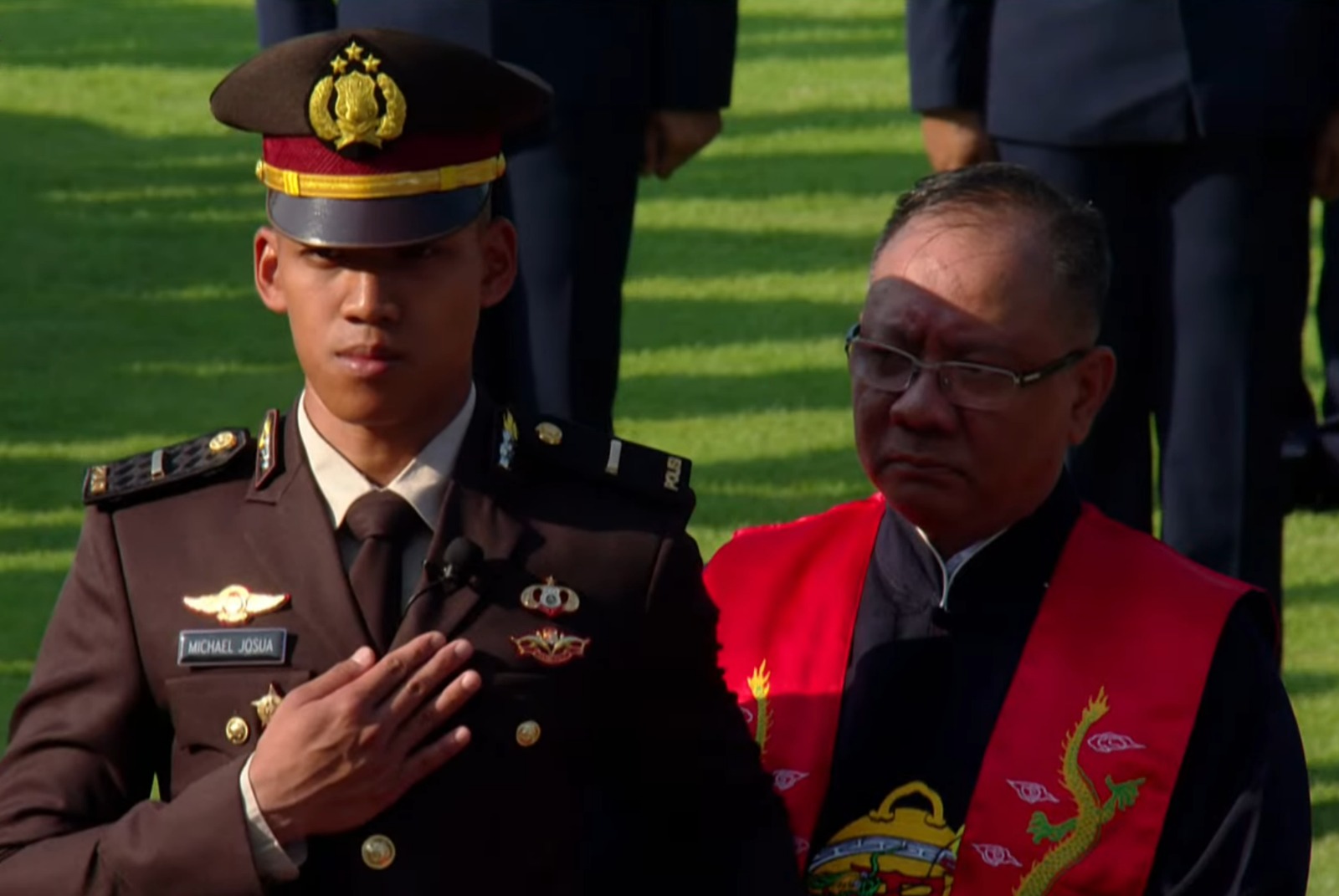 Michael Darmawan Cahyadi Josua, perwira remaja Polri ini maju ke hadapan Presiden Jokowi di halaman istana negara.