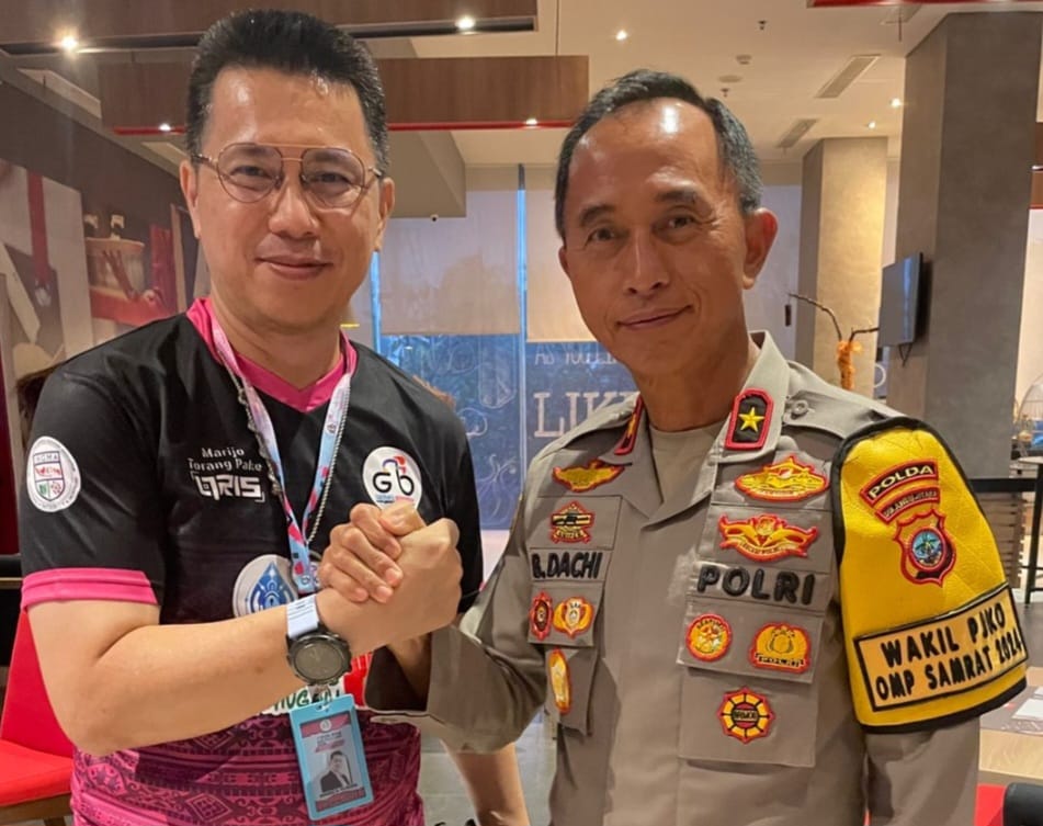 KOLABORASI: Wakapolda Sulut Brigjen Pol Bahagia Dachi bersama Presiden Komunitas Germas Bersepeda dr Enriko H Rawung MARS, yang juga Deklarator Komunitas Dokter Indonesia Bersepeda (Dibers)