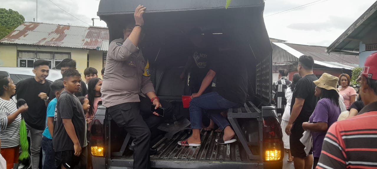 TERDUGA pelaku hipnotis yang diamankan pihak kepolisian di Kota Manado pada Jumat (27/12/2024).