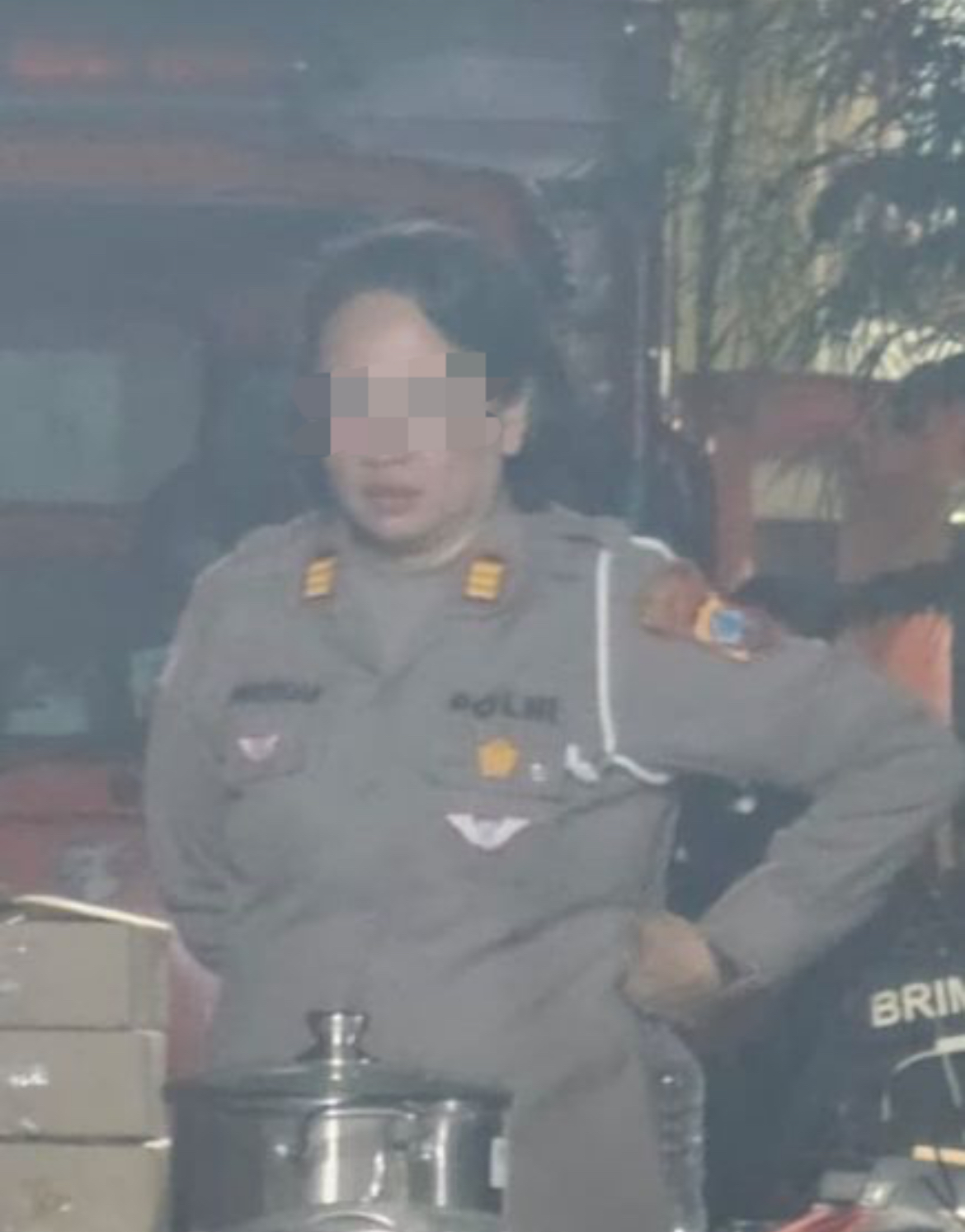 Oknum Polwan yang diduga melarang wartawan yang ikut liputan malam tahun baru rombongan Polda Sulut