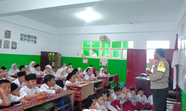 KEPOLISIAN Polresta Kota Manado Memberikan Pembinaan di Sekolah Dasar.