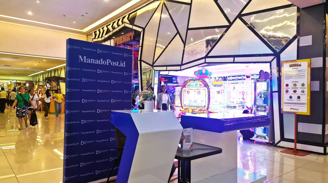 Booth Manado Post yang telah diadakan undian mpeople yang terletak di Manado Town Square 1