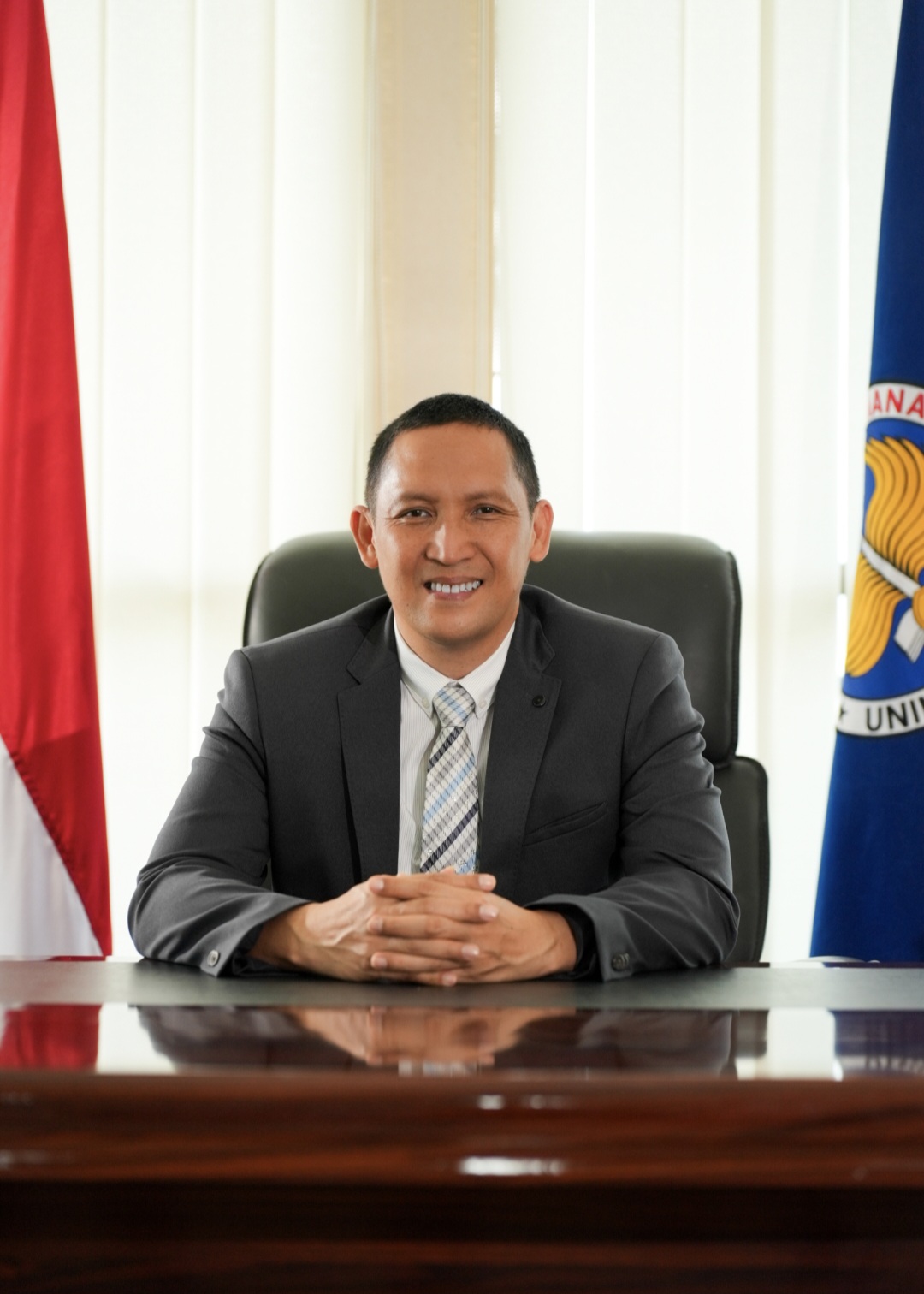 Rektor Unima Dr Joseph Kambey, SE, MBA, Ak