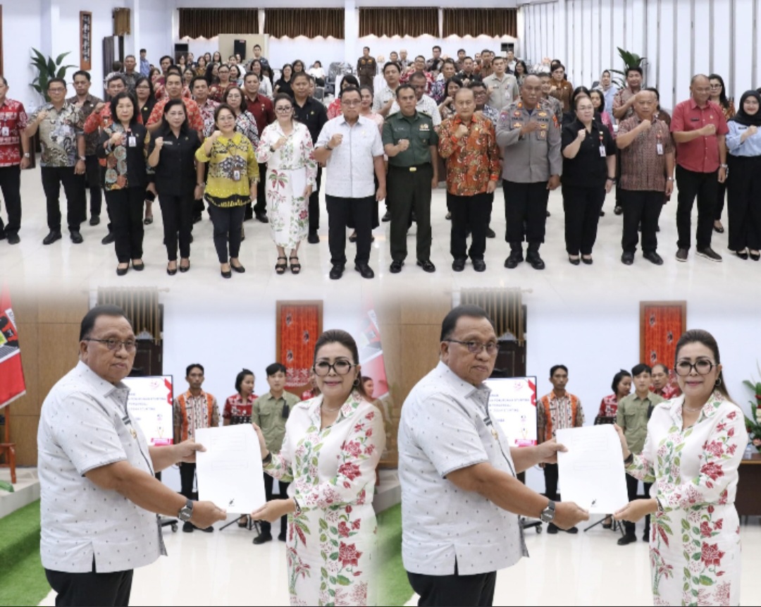 PIMPIN: Martina Lengkong saat menerima SK dari Bupati Robby Dondokambey sebagai Ketua Tim GENTING, Kamis (7/8/2025).