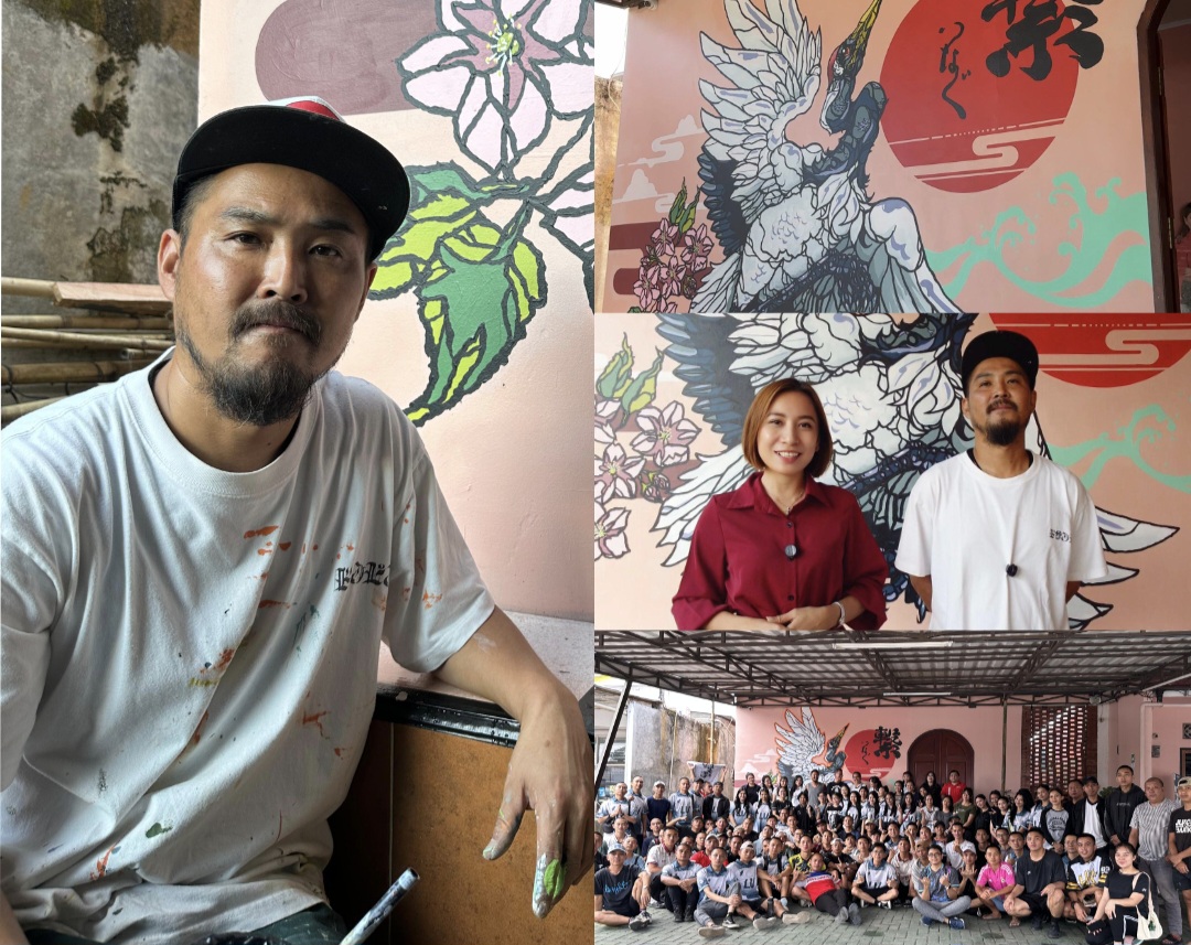 KARYA SENI: Naru (kiri) seniman mural asal jepang saat melukis karyanya di Sekolah TJI milik Liony Mongi, di Tondano.