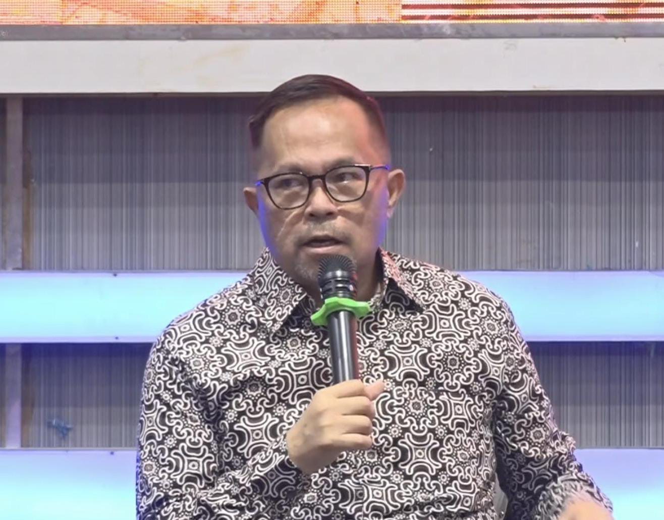 dr Richard Sualang