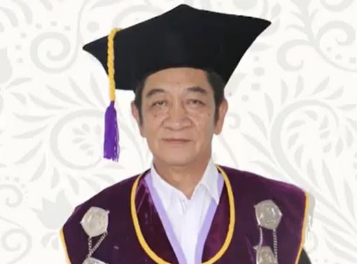 Drs Ferry Raymond Mawikere MHum MA