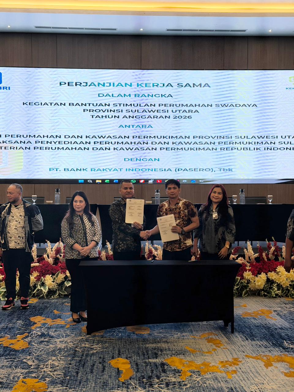 Penandatanganan pembiayaan perumahan swadaya antara BRI dan PPK.