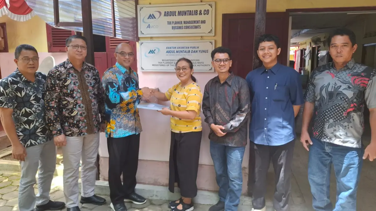 Perumda Air Minum Duasudara Bitung saat menerima hasil audit KAP yang memberikan opini WTP.(Dok Istimewa)