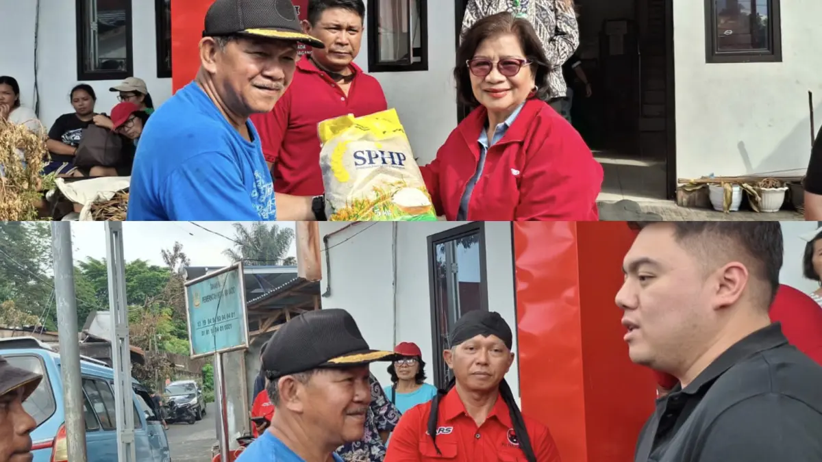 Bendahara DPC Manado dan Ketua DPD PDIP Sulut saat menyerahkan bantuan pada korban kebakaran, Kamis (30/4)