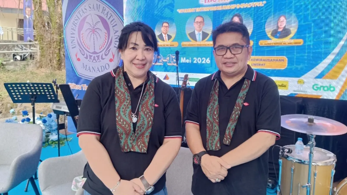 Ketua UPA Pengembangan Karir dan Kewirausahaan Unsrat Manado Dr Olivia Nelwan SE MSi bersama Ketua Panitia Ferdy Roring SE MM QRMP 