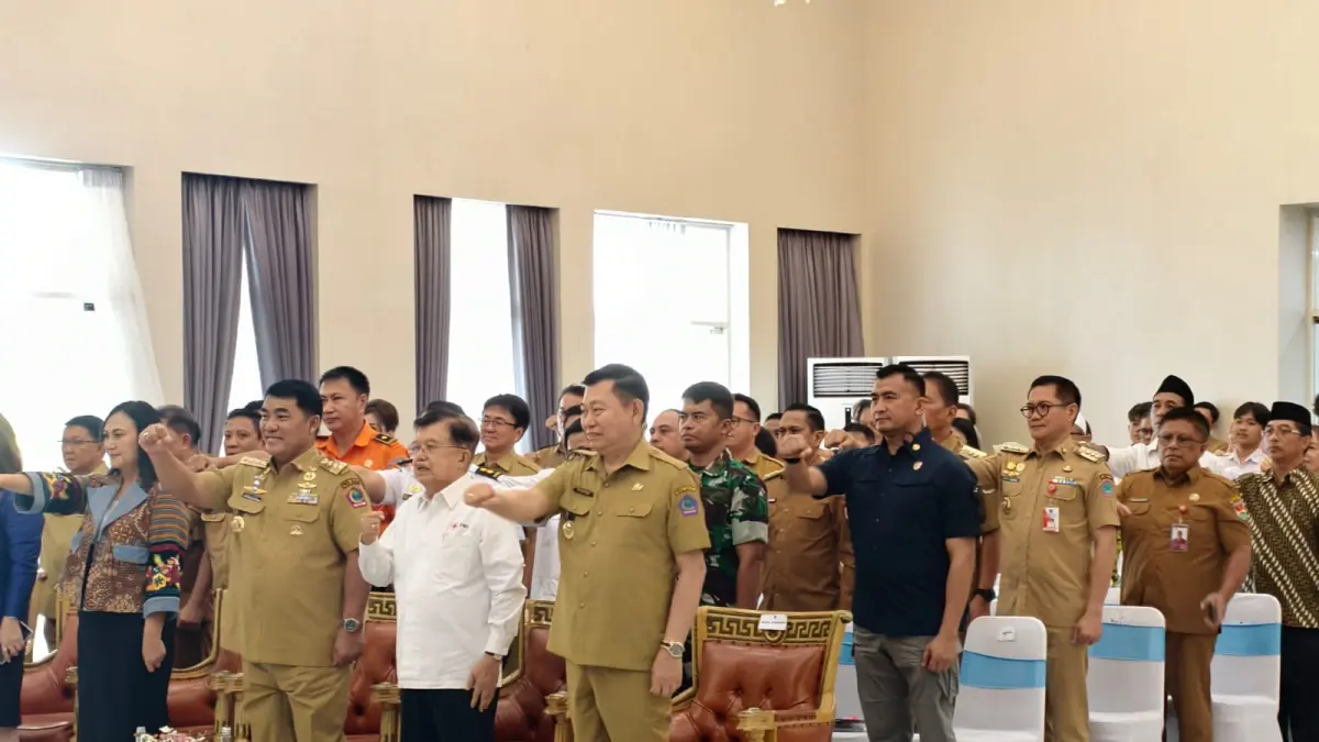 Bupati Minut Joune Ganda saat menghadiri pelantikan PMI Sulut