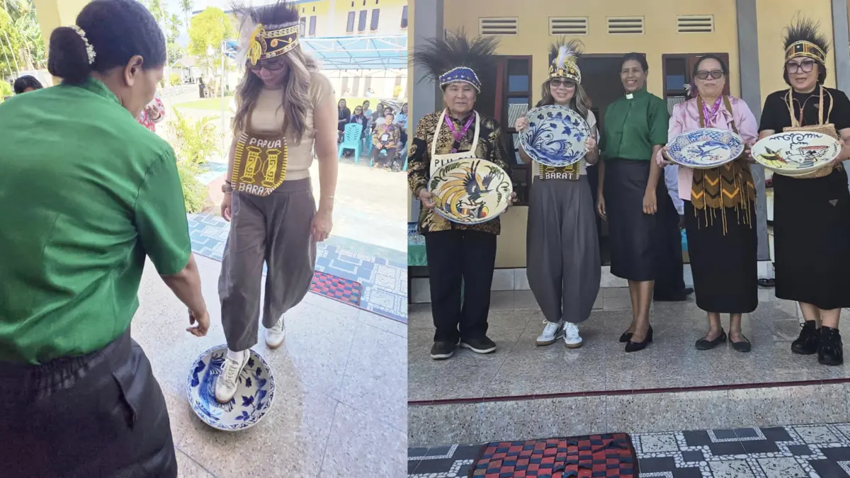 PERSAUDARAAN: Ketua LPPD Manado bersama rombongan memakai mahkota usai disambut dengan upacara adat di jemaat GKI Bahterah Pasirido Klasis Manokwari Papua Barat, Minggu (21/6)
