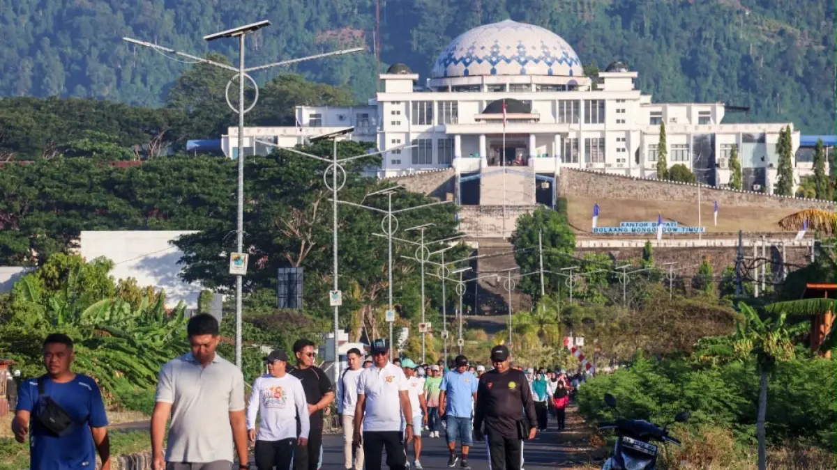 HUT Boltim ke-18 dimeriahkan jalan sehat, tarian Dana-Dana, cek kesehatan gratis, dan donor darah yang diikuti ratusan peserta.