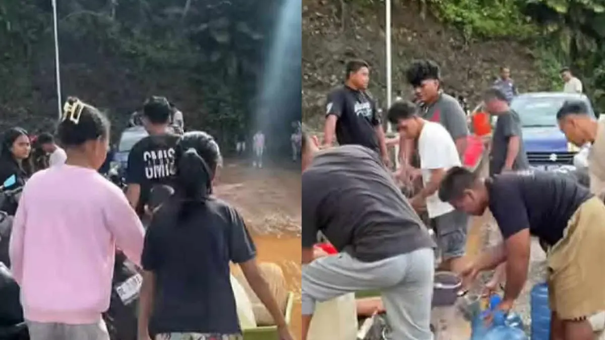 Pendistribusian Air bersih di lokasi terdampak bencana banjir di kecamatan Tamako, Sangihe, Kamis (23/7/26).