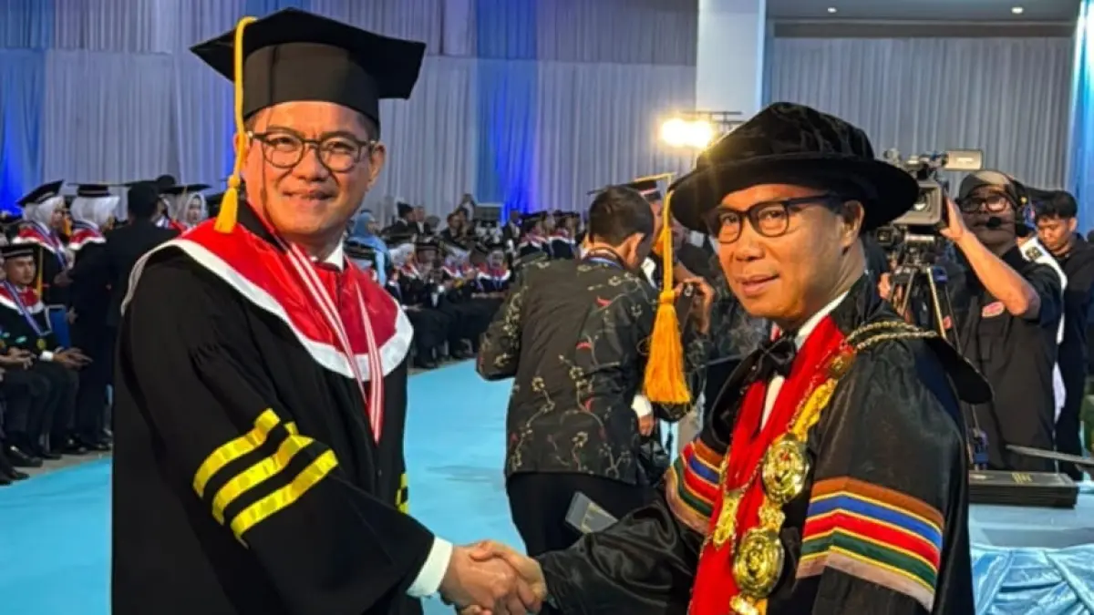 Berprestasi- Bupati Minahasa Utara Joune Ganda saat mengikuti Wisuda Studi Doktor di Institut Pemerintahan Dalam Negeri (IPDN) Tahun Akademik 2025/2026 dengan predikat cumlaude.
